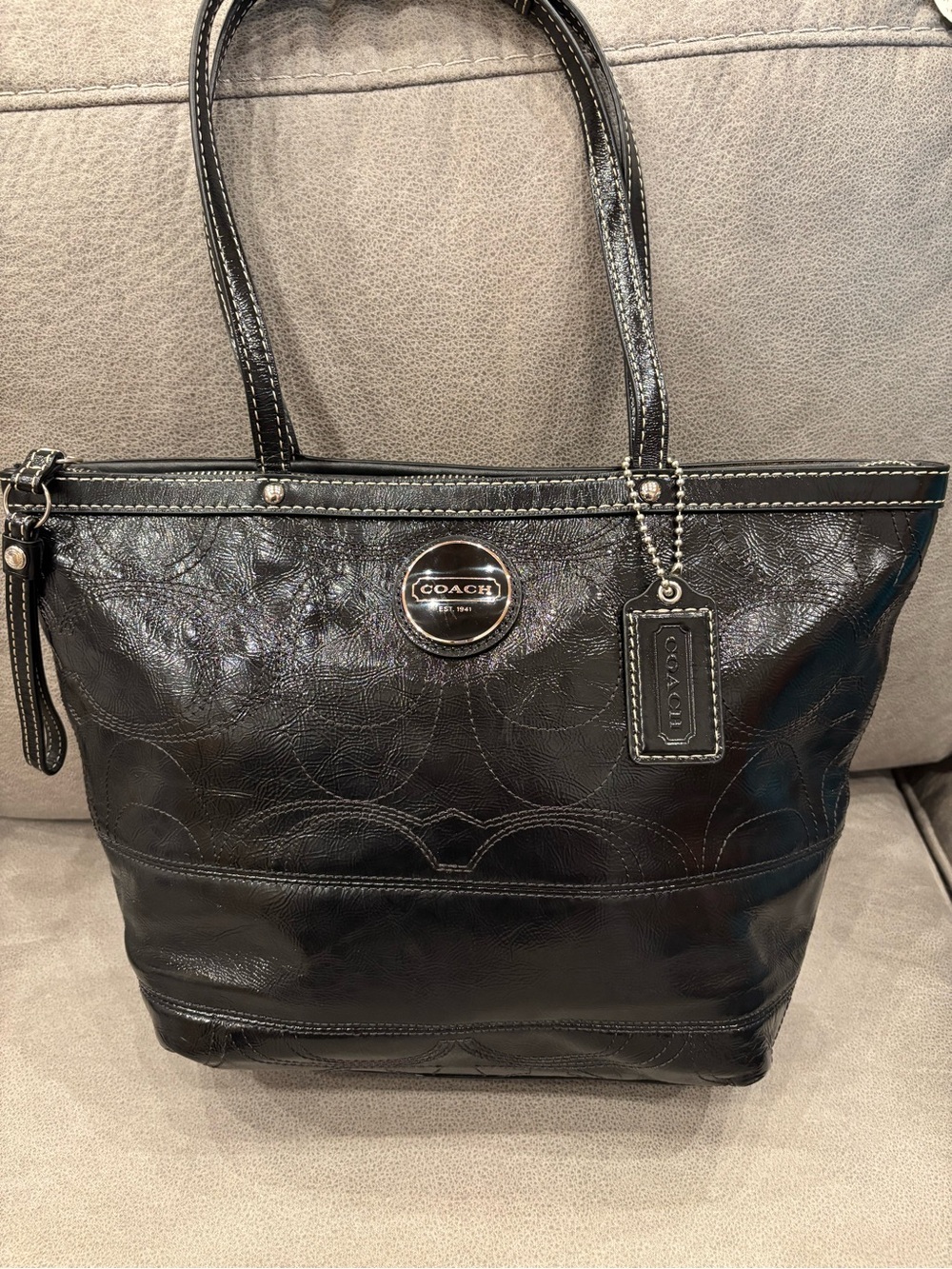 Gorgeous, black coach, patent leather satchel with logo tag